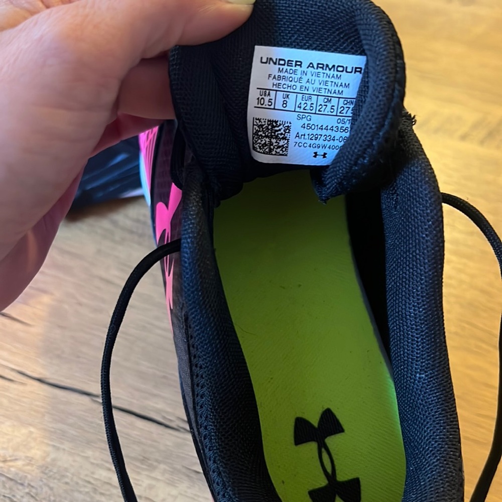 Worn once or twice, under armour woman’s cleats 10.5